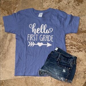 Youth small first grade shirt